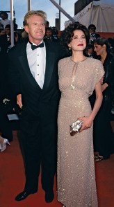 Actress Annette Bening (in Bugsy by Albert Woksky) and actor Ed Begley Jr. arrive at the 1991 Academy Awards��. This photo appears in Frank Trapper's RED CARPET book on page 94 (Photo by Frank Trapper/Corbis via Getty Images)